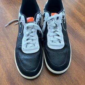 Nike Black and White Sneakers with Orange Accents